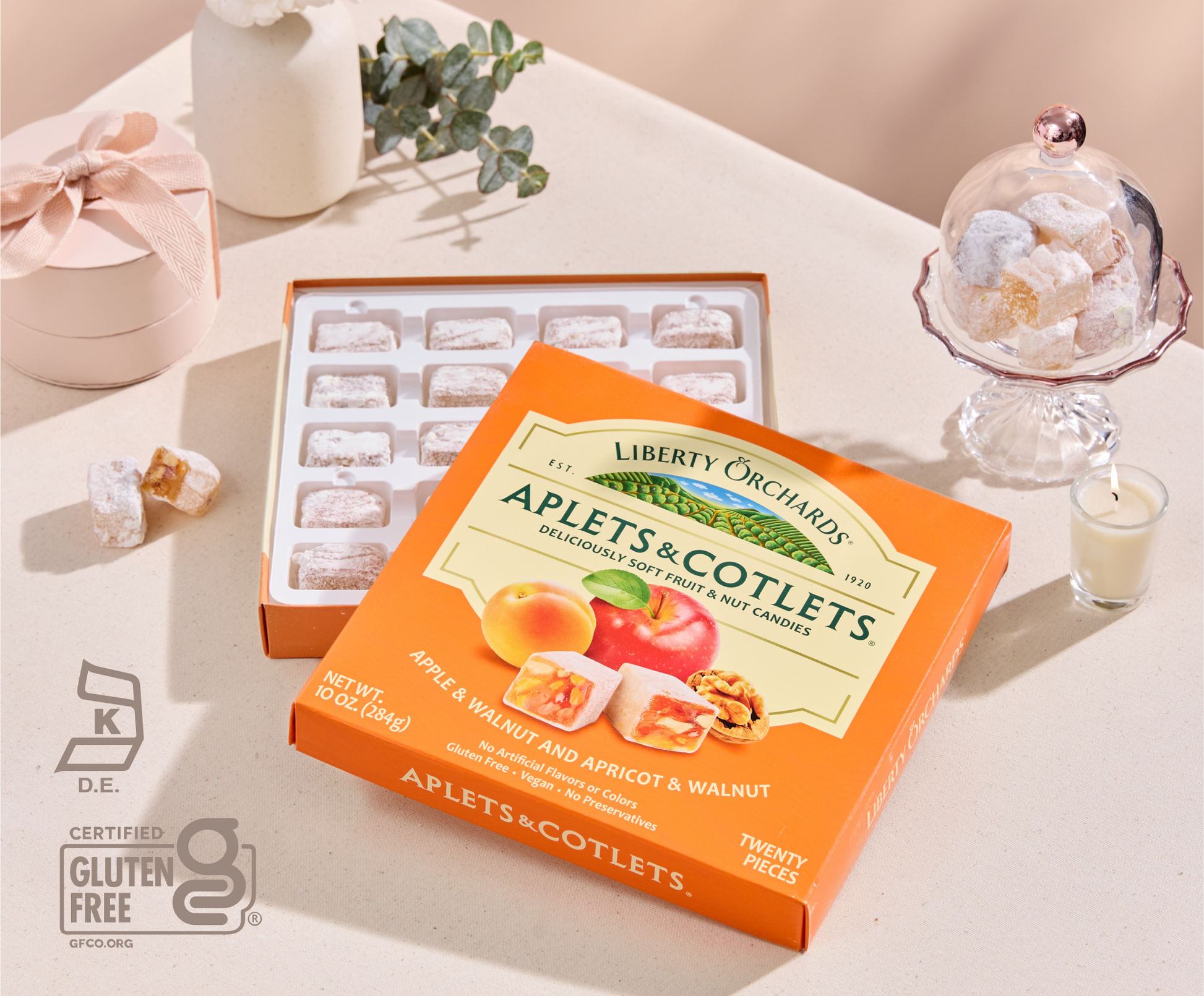 Open holiday Aplets & Cotlets box showing apple and apricot chews