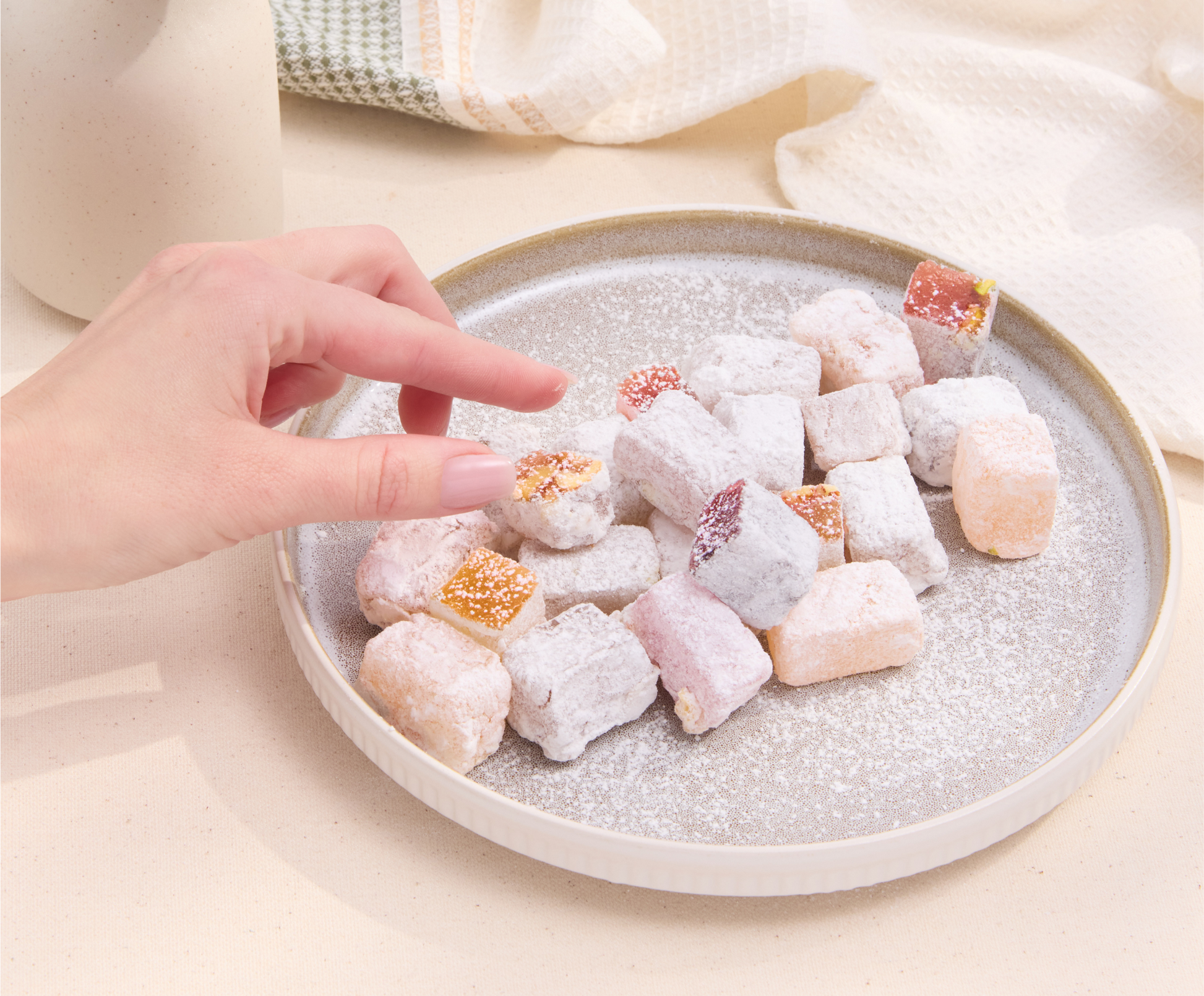 Berry Delights candy served in hand – soft fruit and nut confection with berries and walnuts